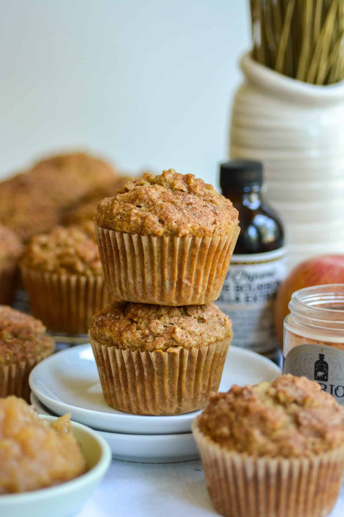 Two Applesauce Oatmeal Muffins stacked on top of each other.