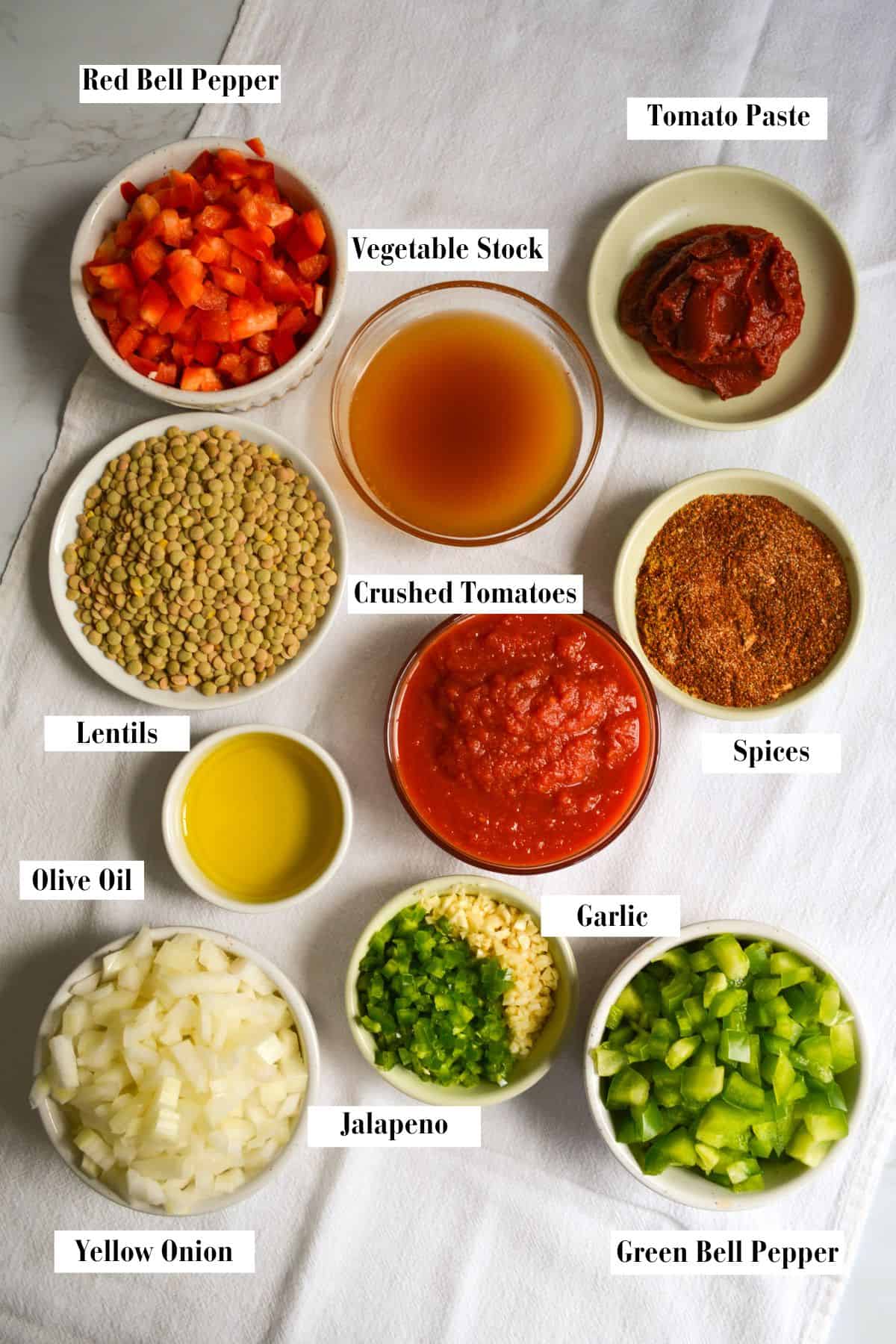 Ingredients for making this recipe in small bowls on a linen cloth.