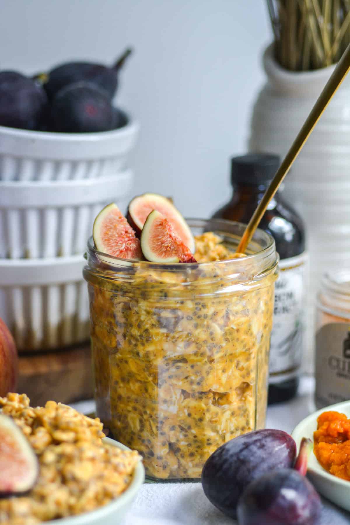 Pumpkin Pie Overnight Oats in a jar topped with figs.