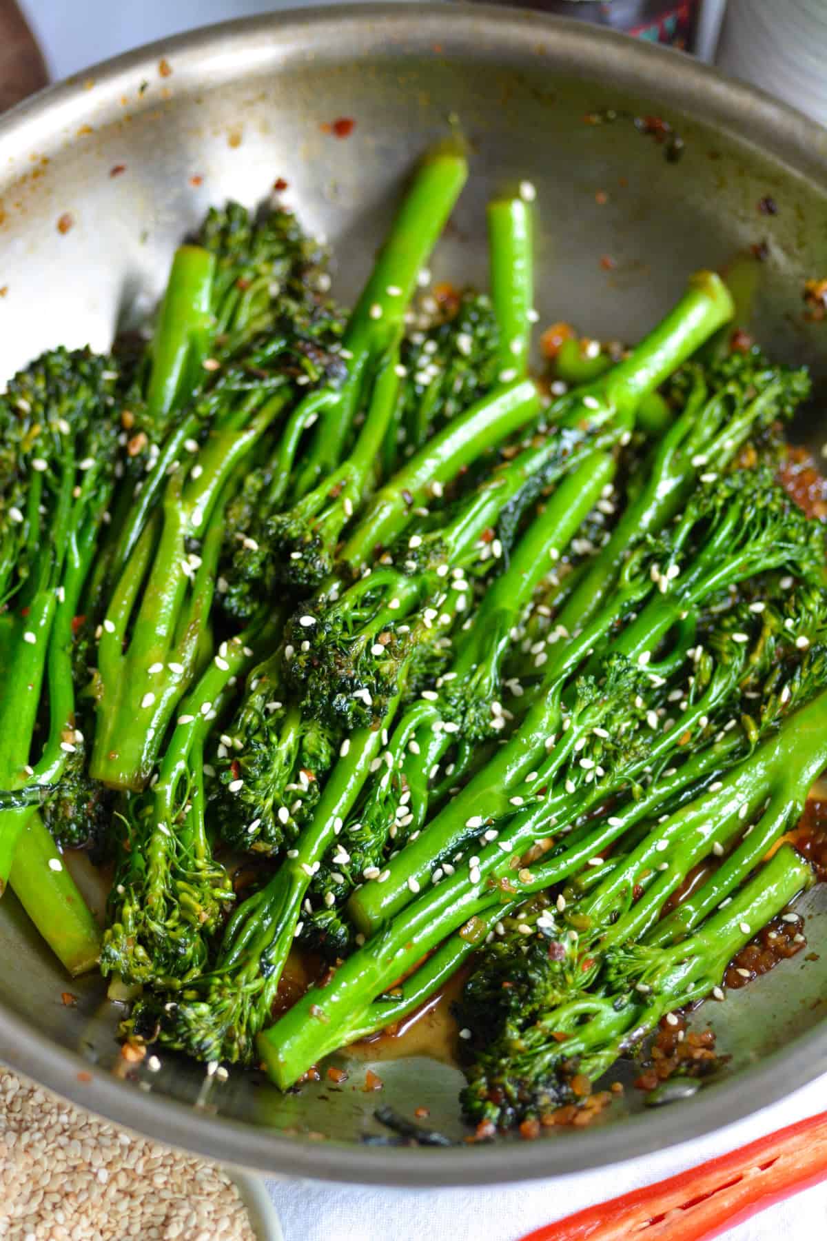 Stir Fried Broccolini in a skillet.
