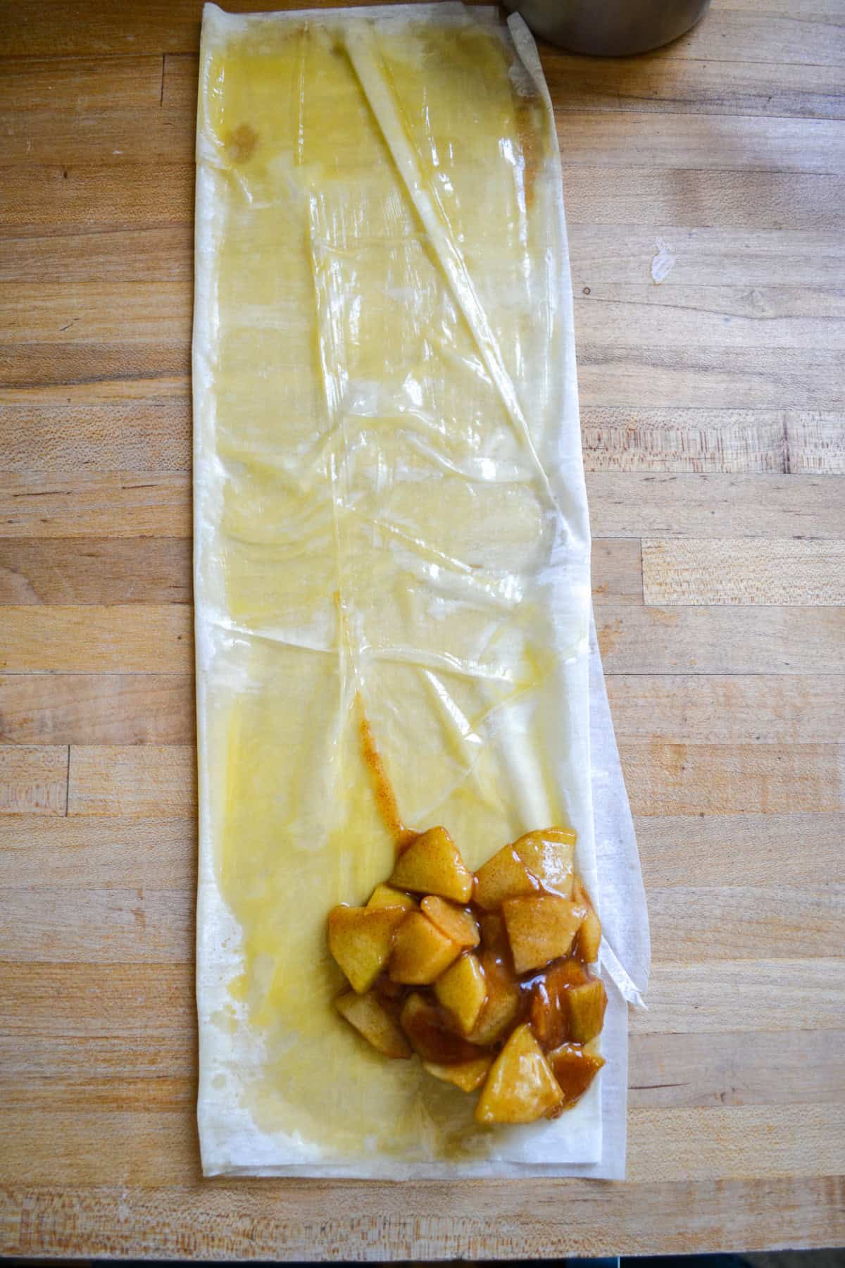 Phyllo dough topped with apple cinnamon filling.