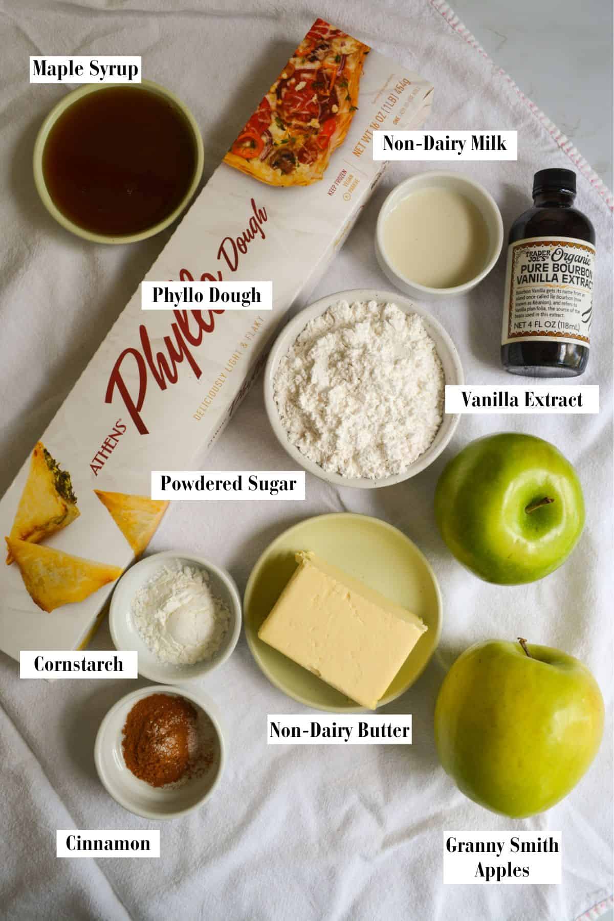 Ingredients for making this recipe in small bowls on a linen cloth.