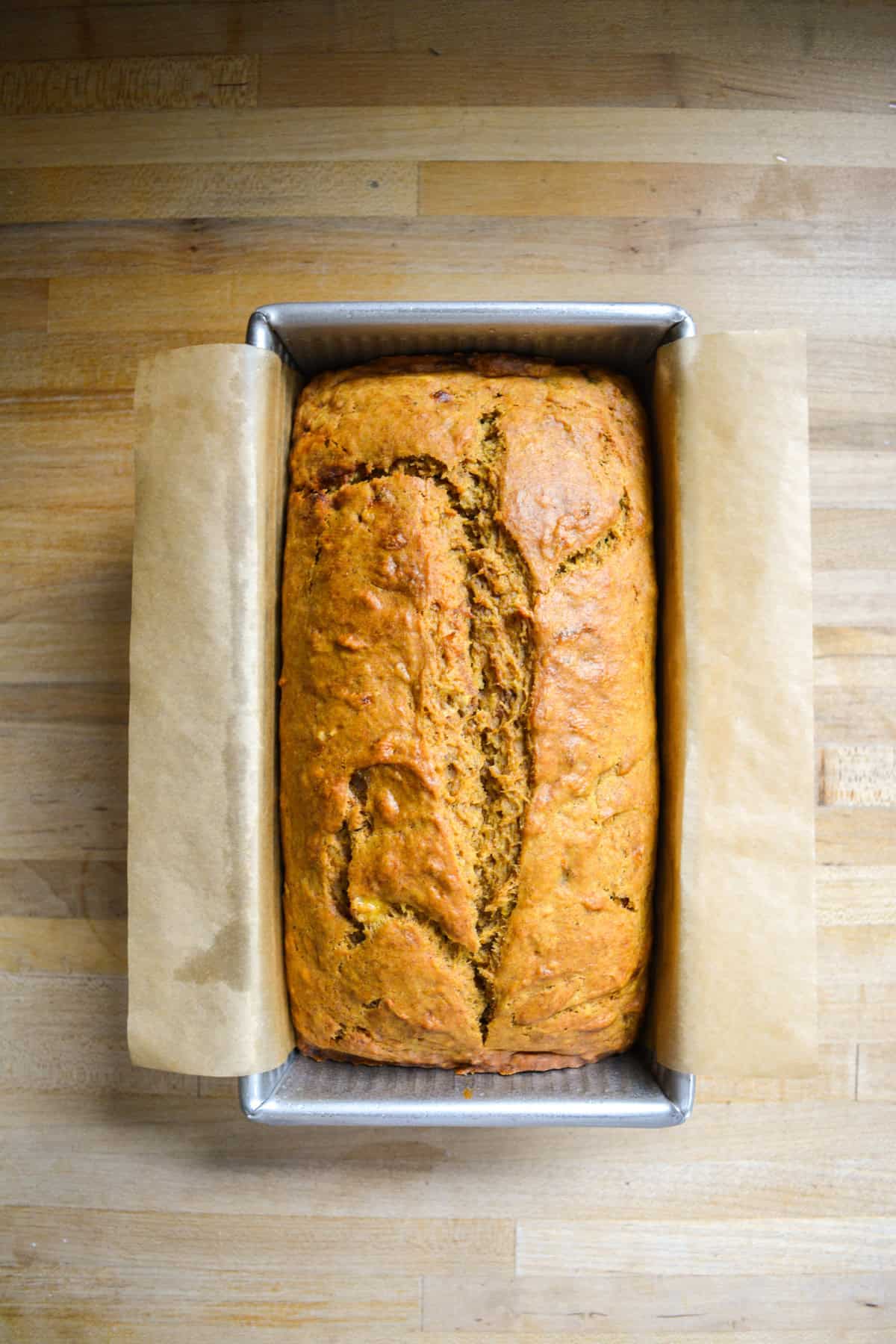 Baked Vegan Banana Pumpkin Bread in a loaf pan.