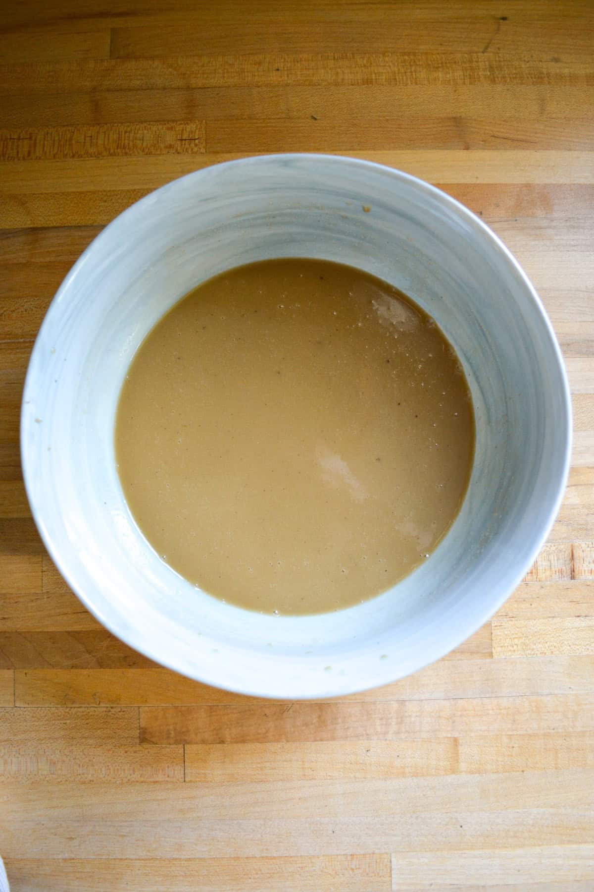Wet ingredients in a large mixing bowl.
