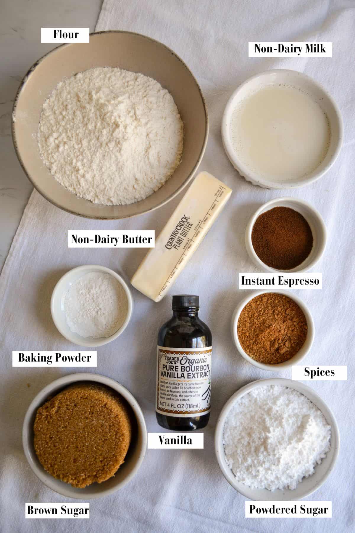Ingredients for making this recipe in small bowls on a linen cloth.
