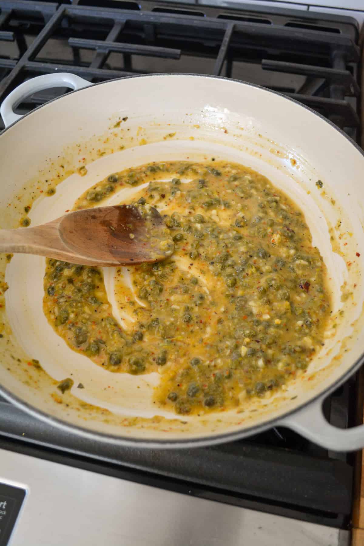 Lemon juice and zest added to the large pan.