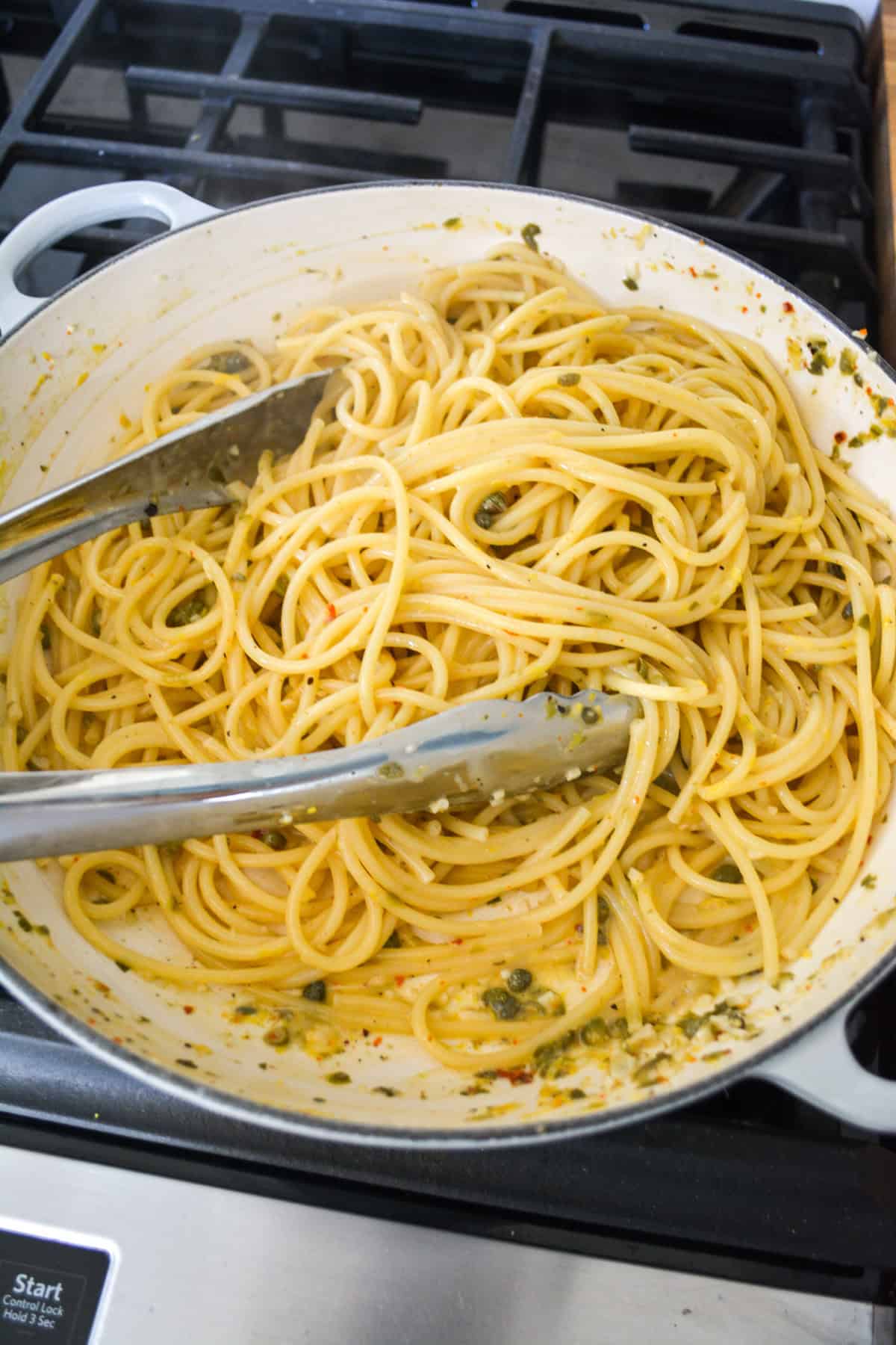 Pasta tossed together with the sauce.