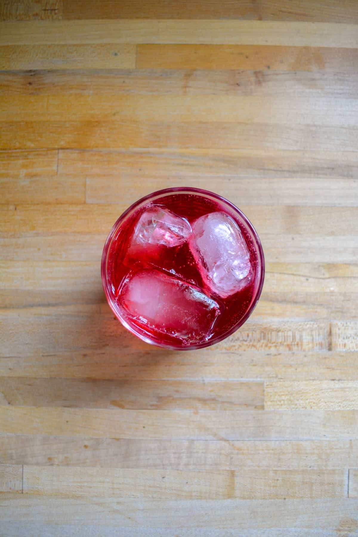 Ice added into the rocks glass.