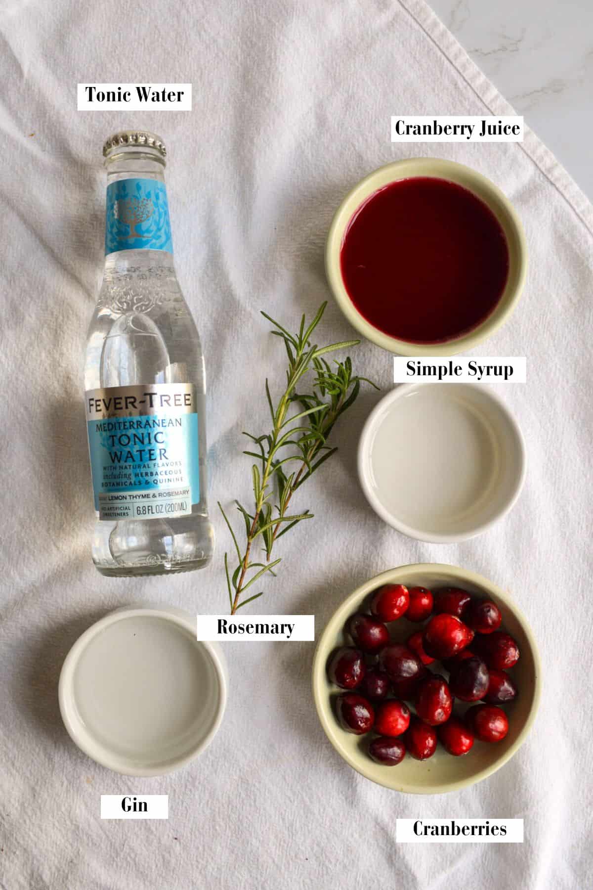 Ingredients for this recipe in small bowls on a linen cloth.
