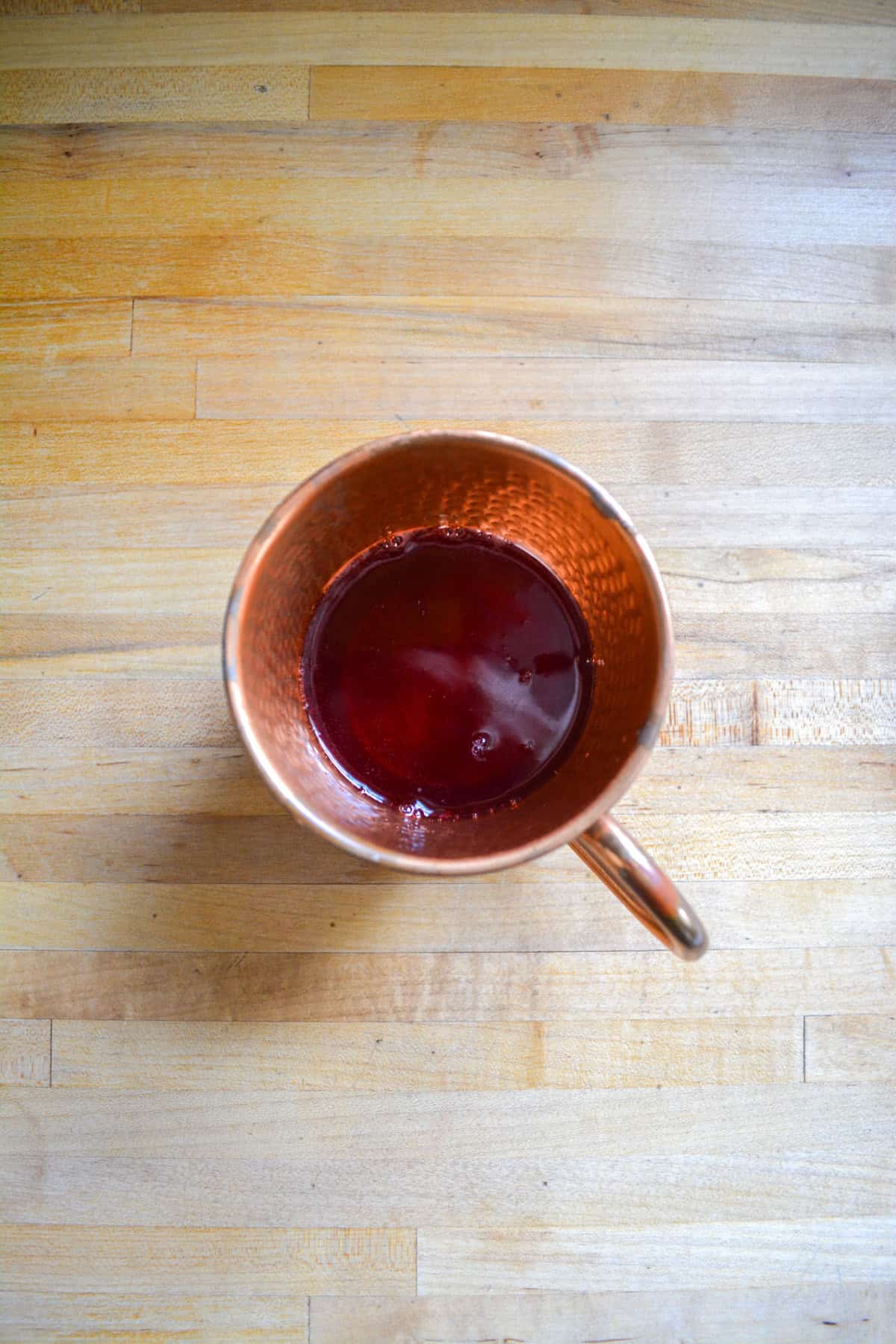 Liquid in a copper mug.