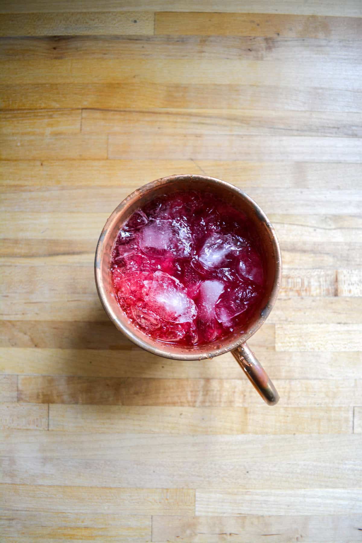 Icy liquid in a copper mug.