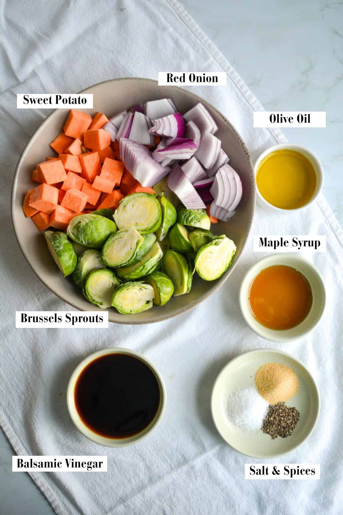 Ingredients for making this recipe in small bowls on a linen cloth.