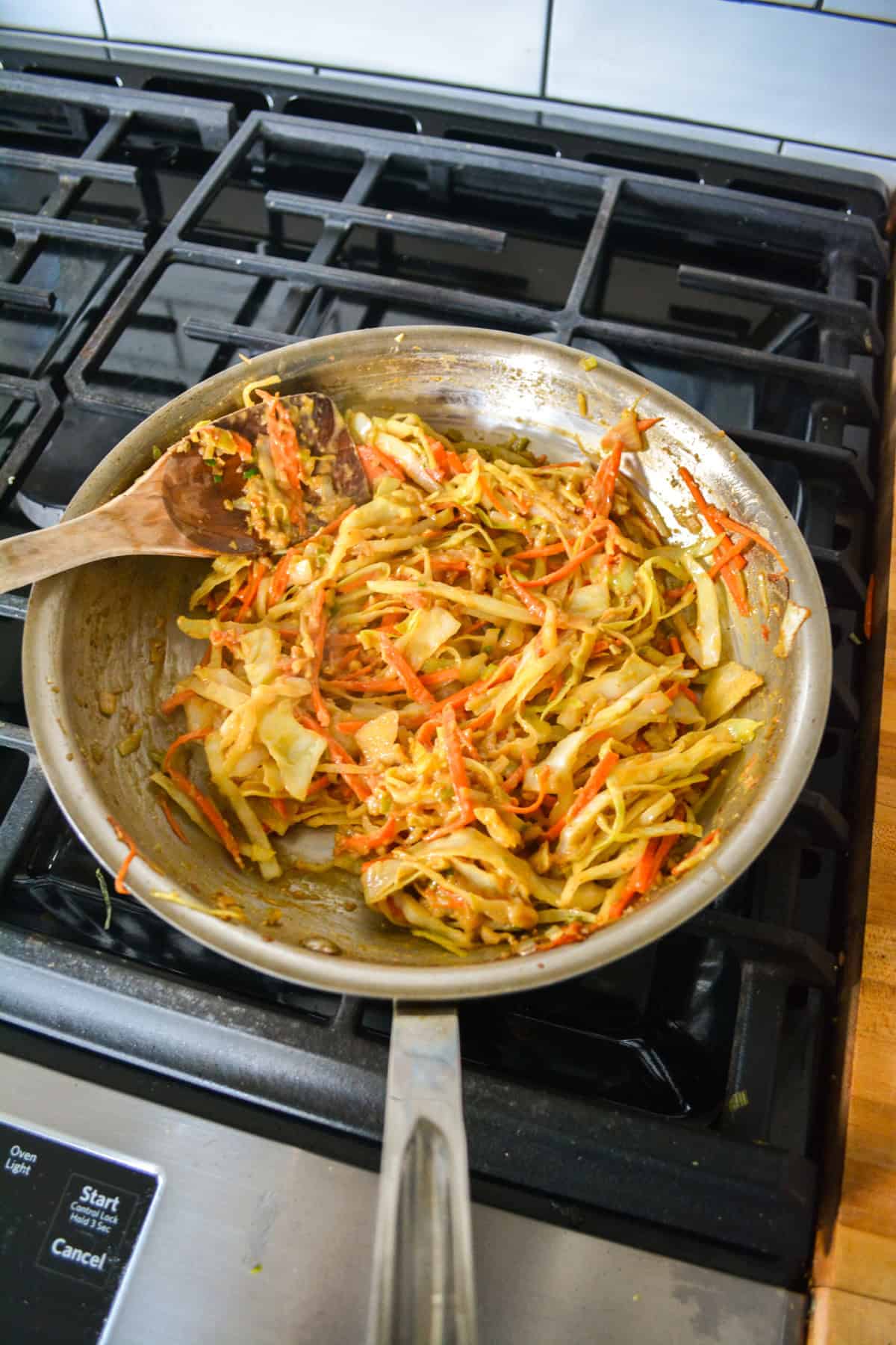 Peanut butter sauce added into the skillet.