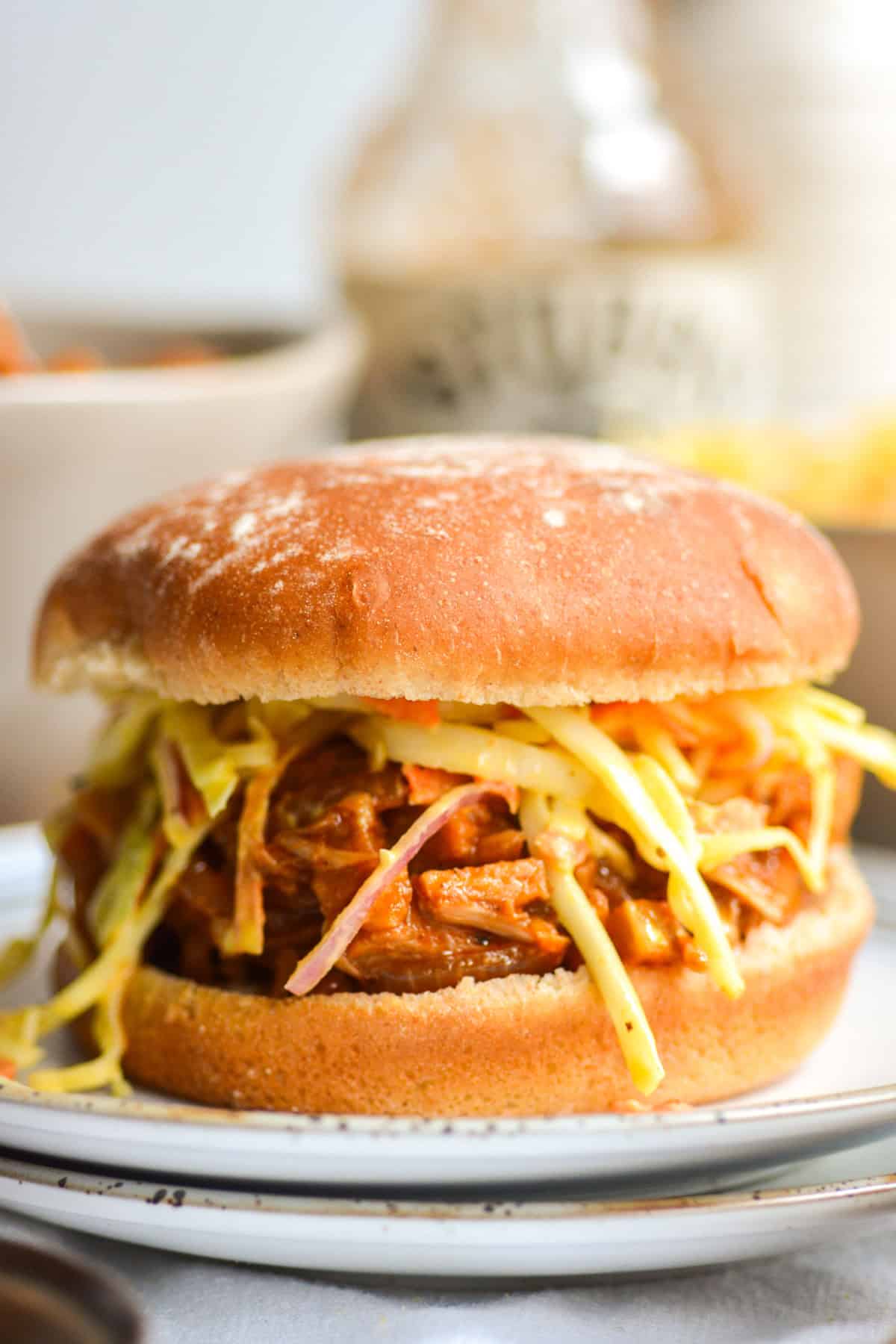 Smoky Barbecue Jackfruit Pulled Pork on a bun with coleslaw.