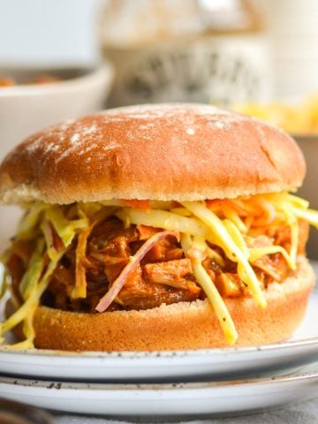 BBQ Jackfruit Pulled Pork on a bun with coleslaw.