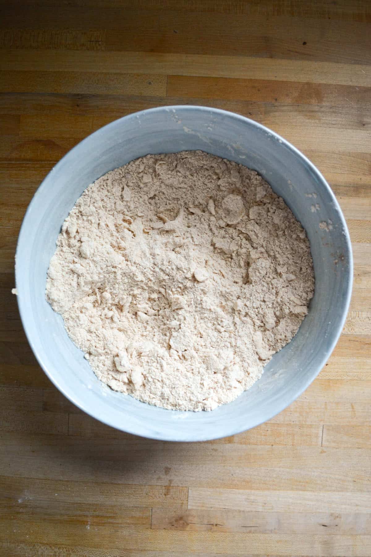 Butter cut into the dry ingredients in a large bowl.