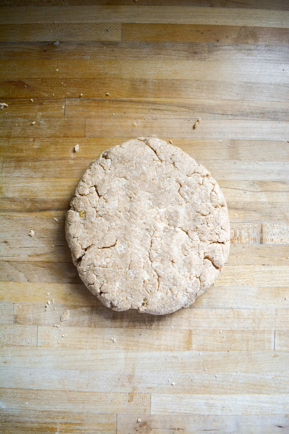 Scone dough pressed into a circle.