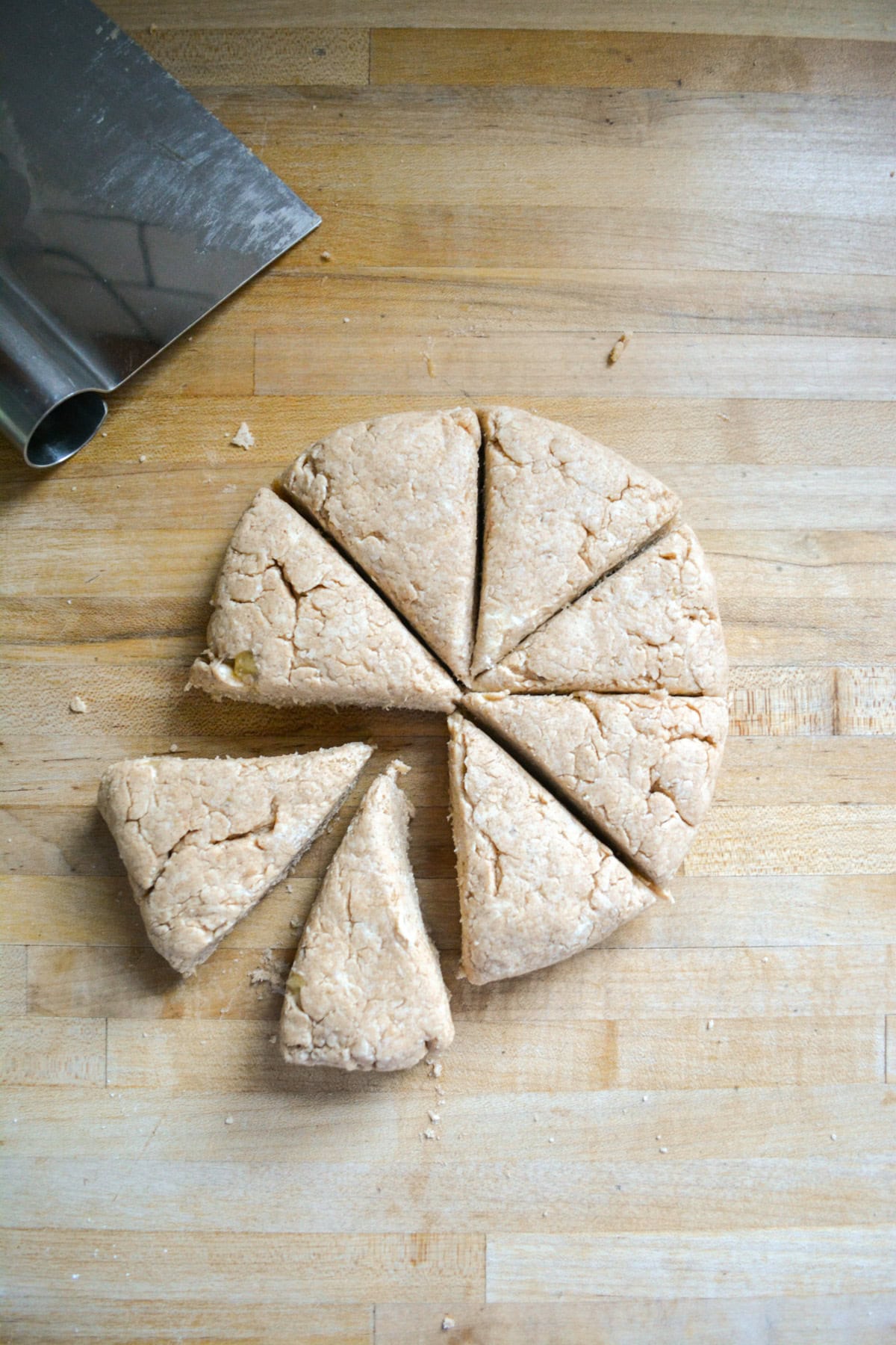 Scone dough cut into triangles.