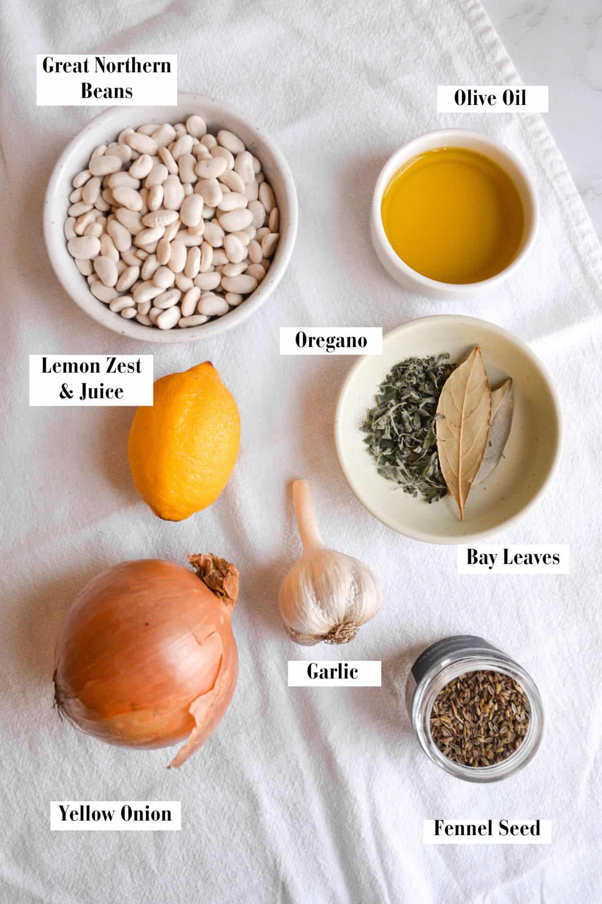 Ingredients for making this recipe in small bowls on a linen cloth.