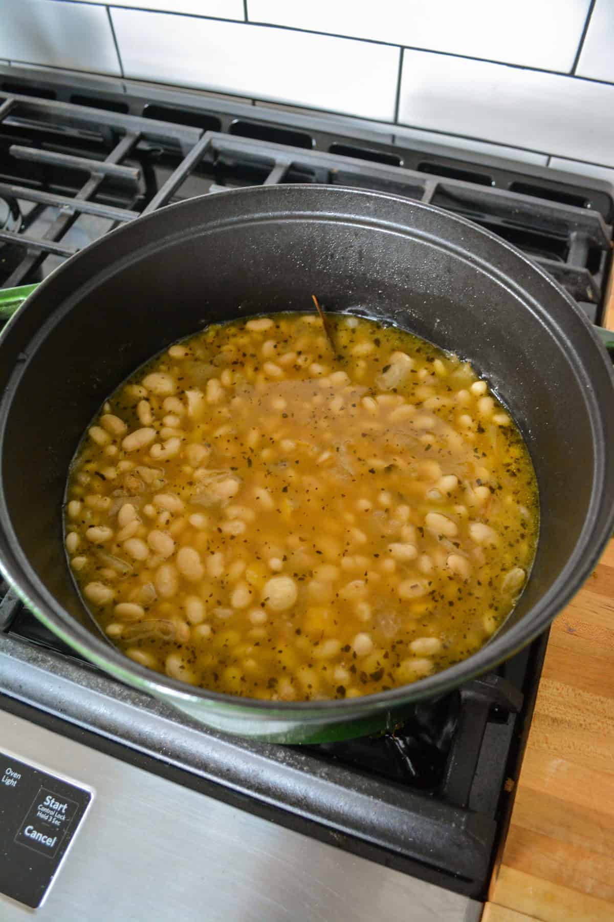 Cooked beans in a large pot.