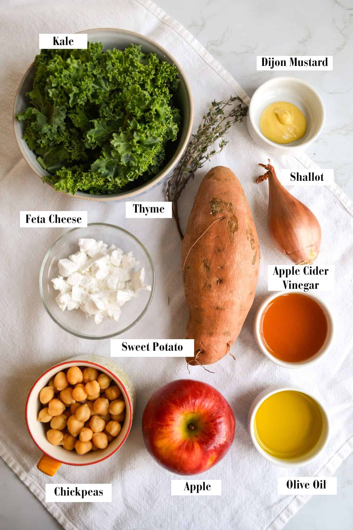 Ingredients for this recipe in small bowls on a linen cloth.
