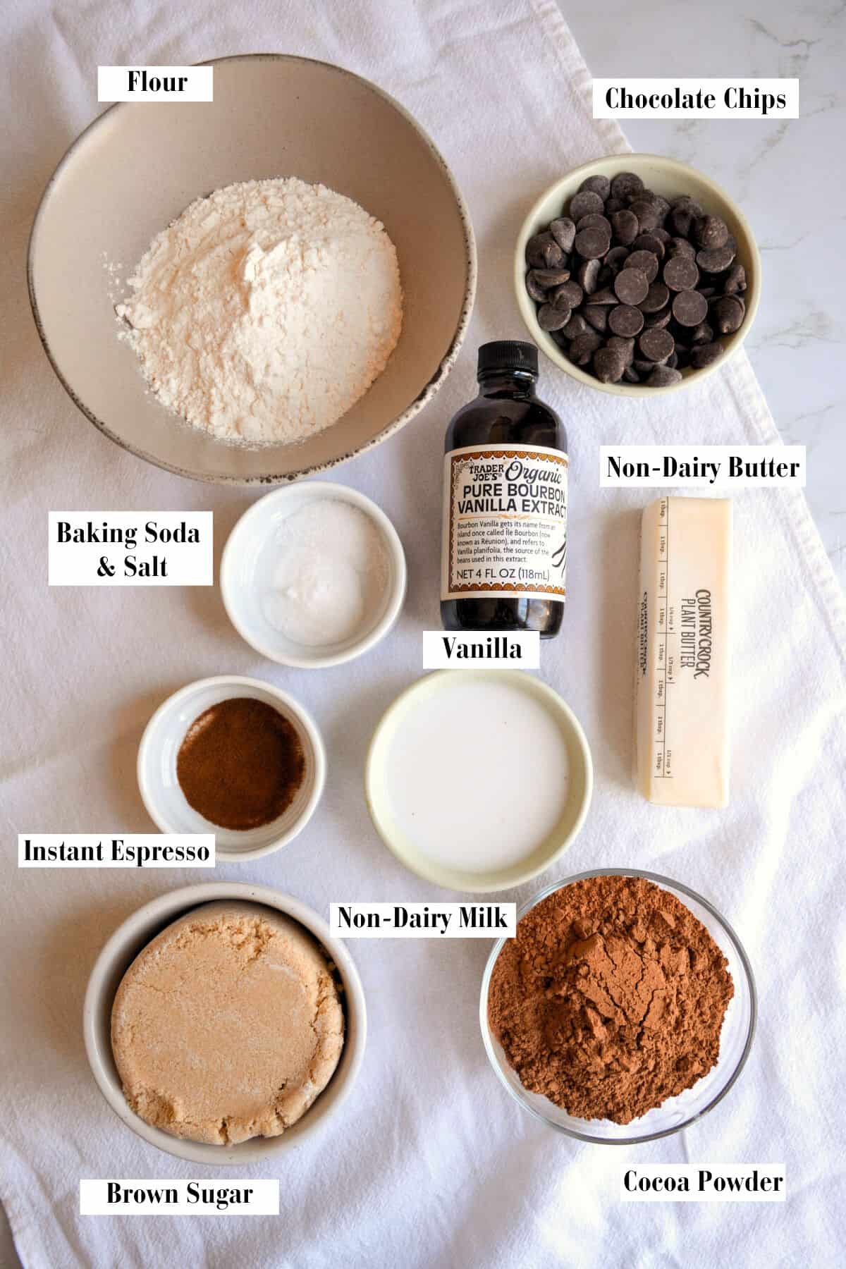 Ingredients for this recipe in small bowls on a linen cloth.