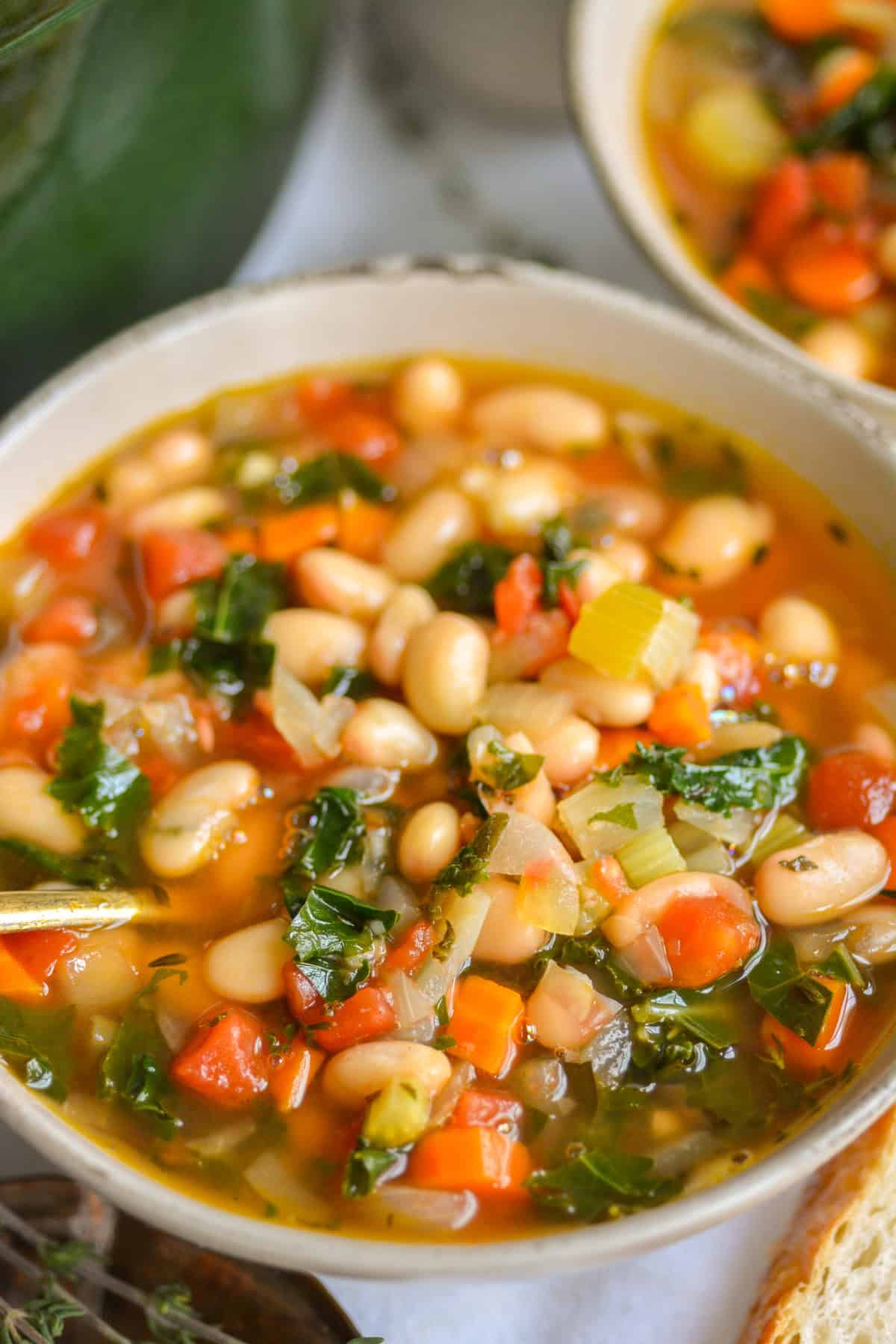 Vegan Tuscan White Bean Soup in a bowl.