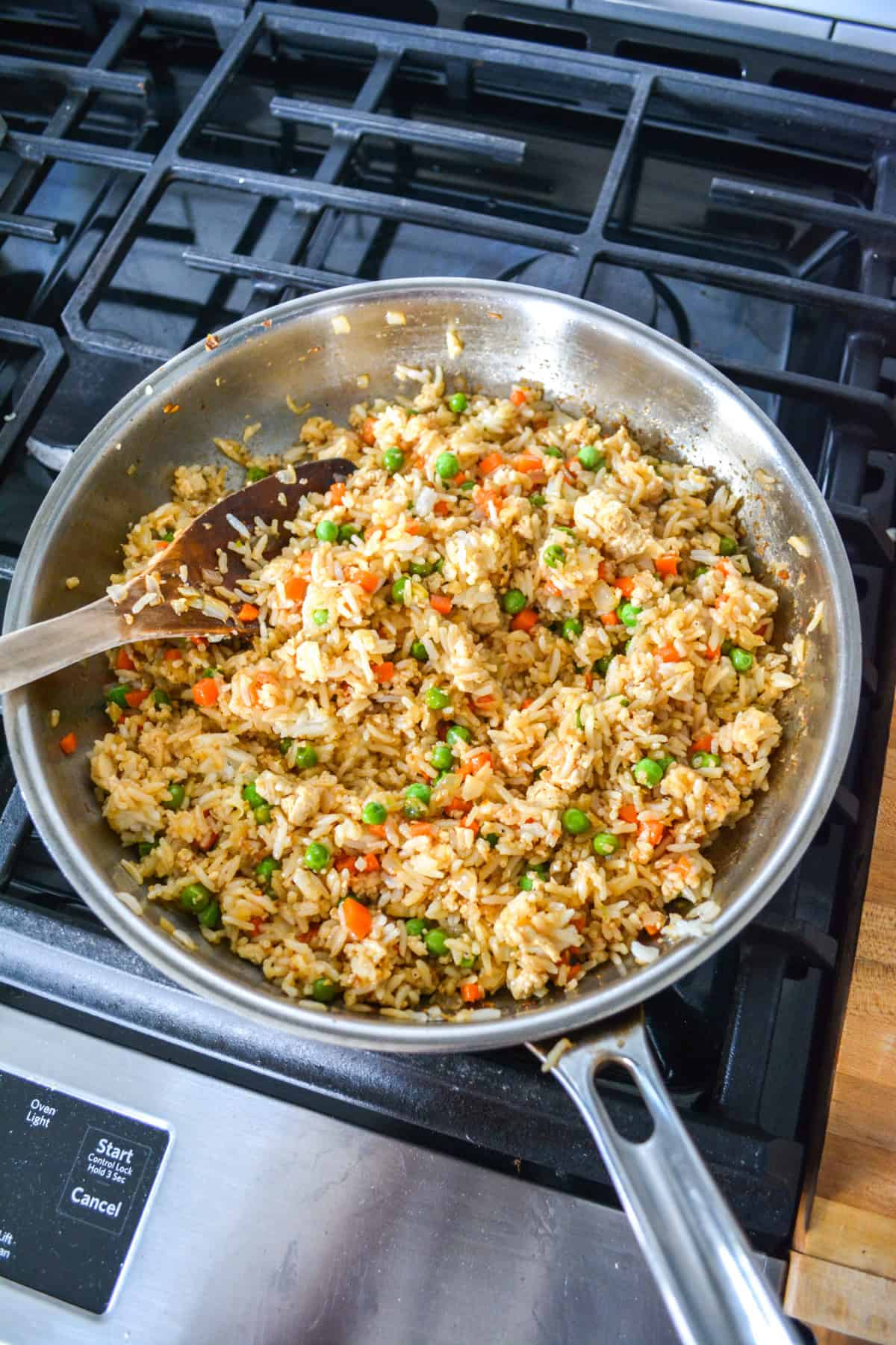 Vegan Fried Rice cooking in a skillet.