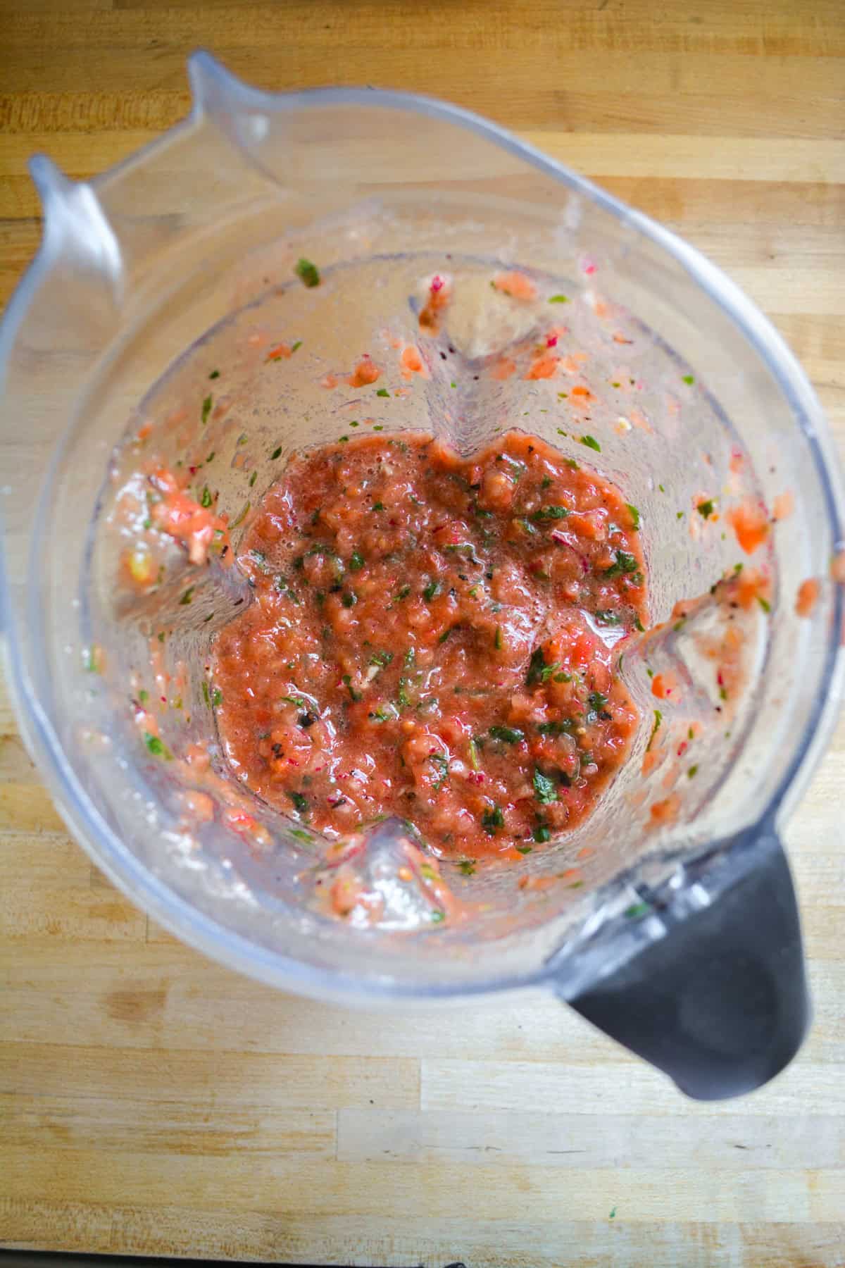 Homemade salsa in the pitcher of a Vitamix blender.