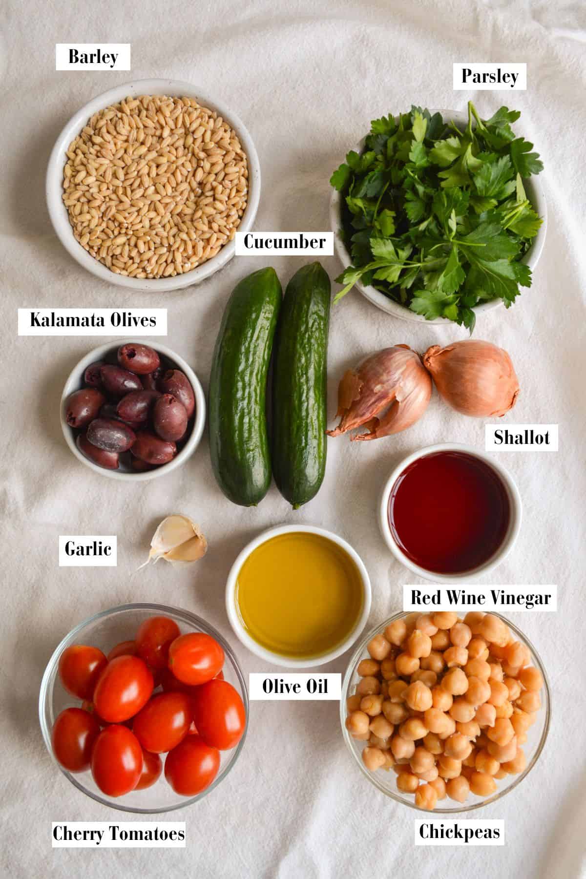 Ingredients for this recipe in small bowls on a linen surface.