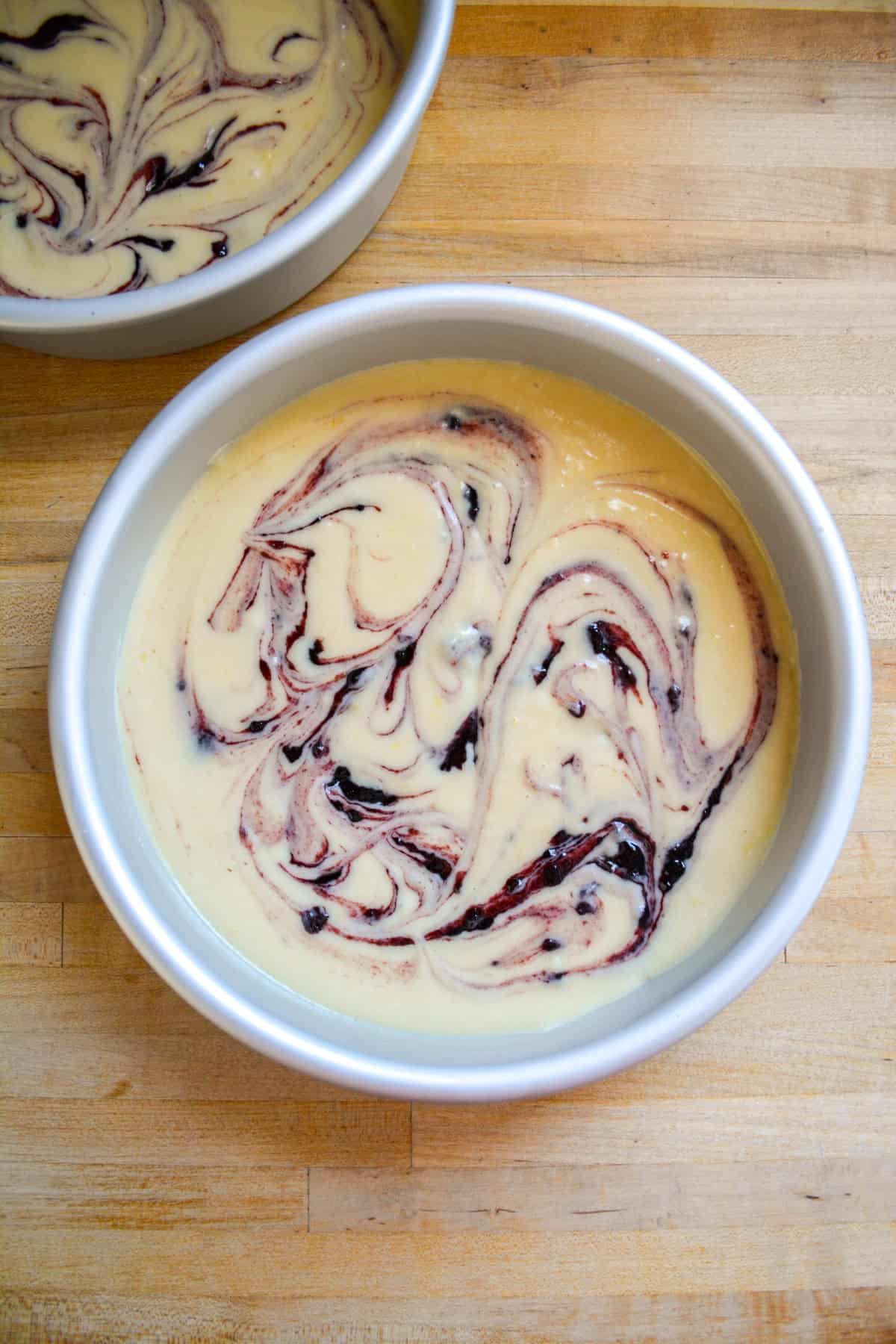 Blackberry jam swirled into cake batter.