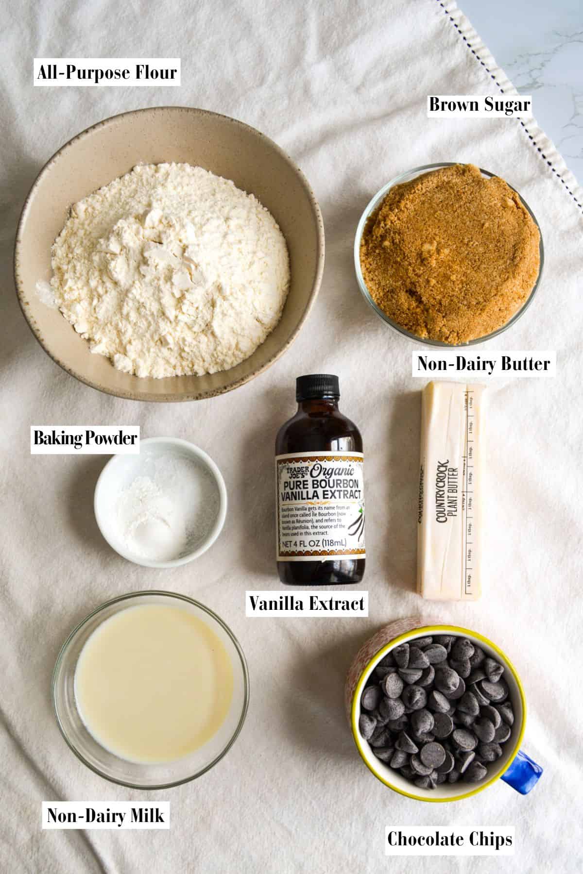 Ingredients for this recipe in small bowls on a linen surface.