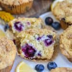 A Vegan Blueberry Muffin that has been cut in half.