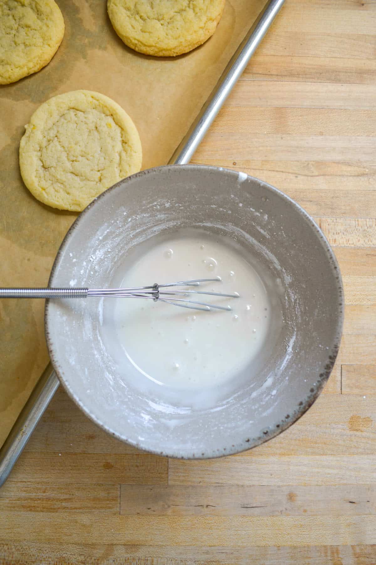 Lemon glaze in a small bowl.