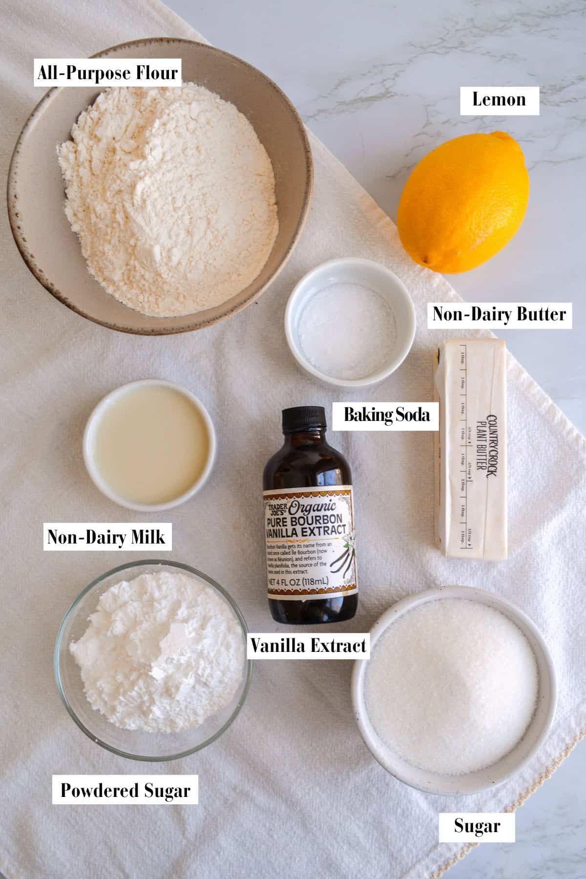 Ingredients for this recipe in small bowls on a linen cloth.