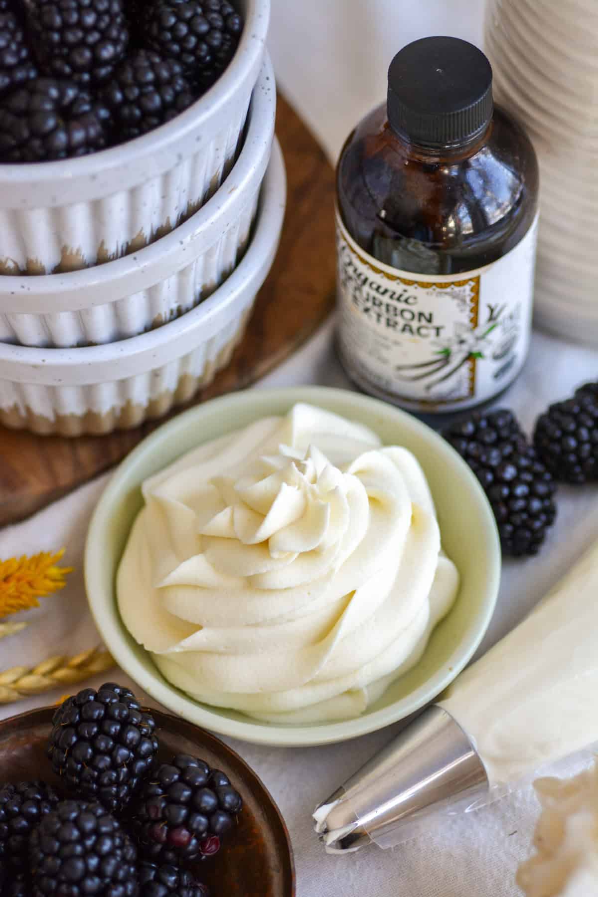 Vegan Whipped Cream Frosting piped into a small bowl.