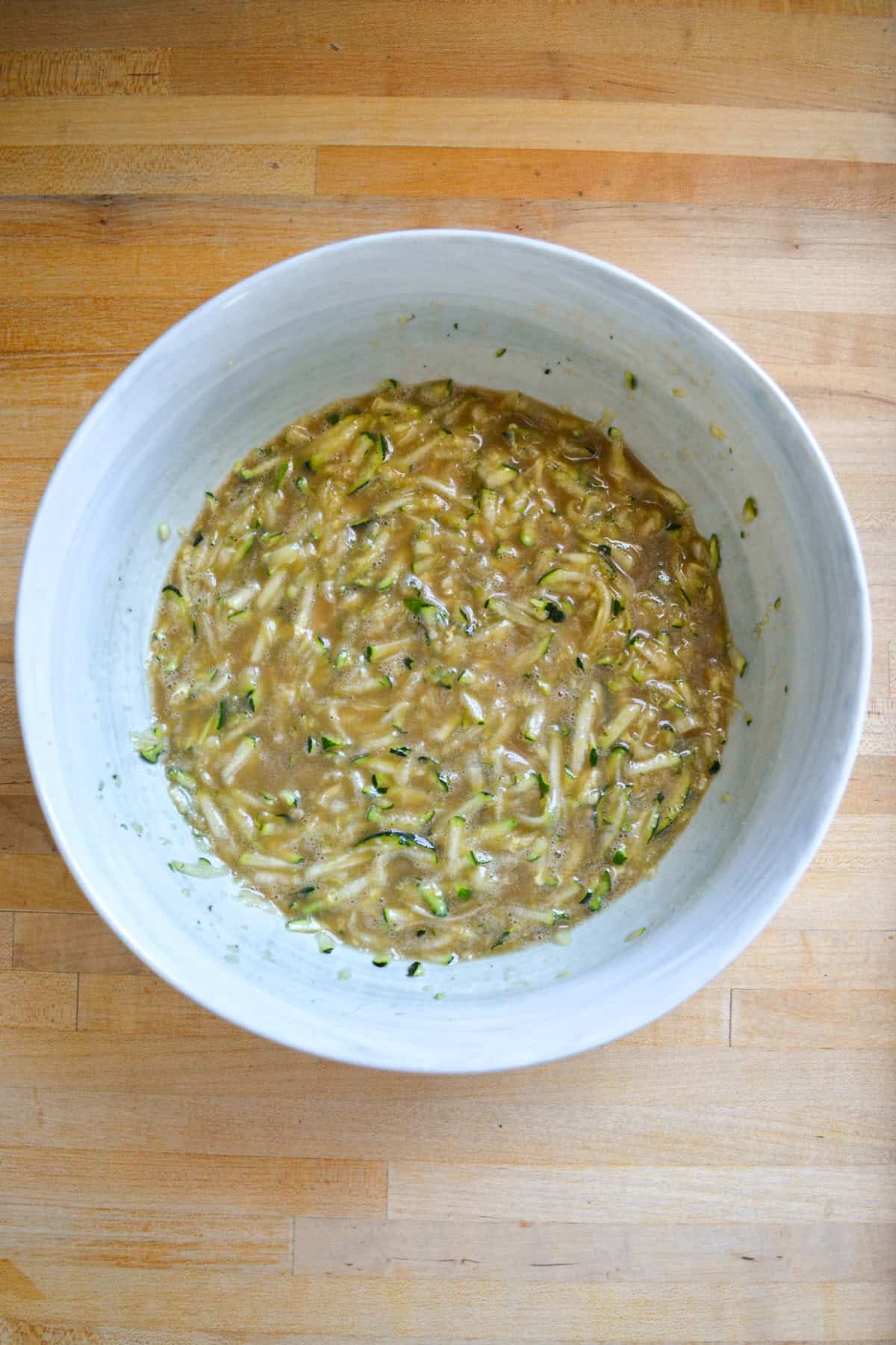 Wet ingredients in a large mixing bowl.