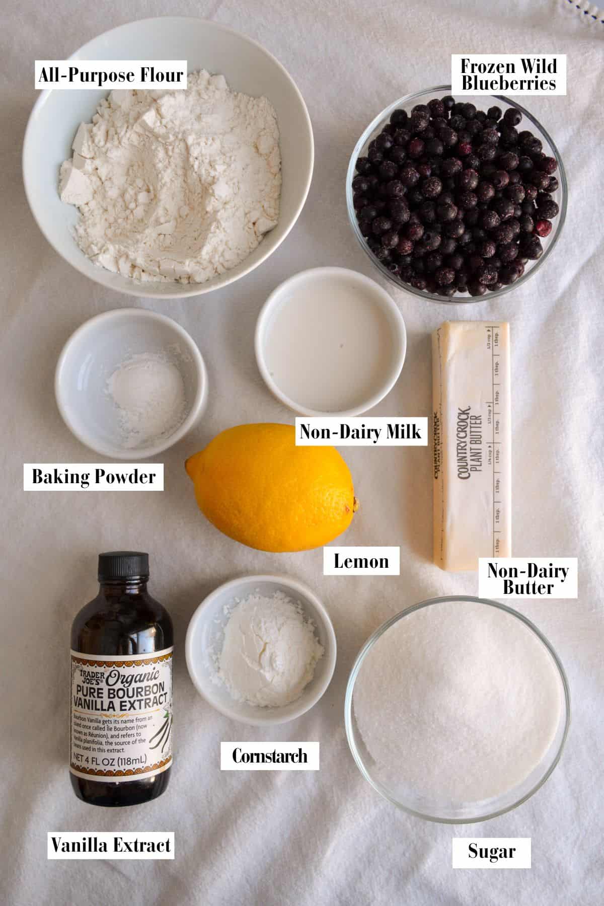 Ingredients for this recipe in small bowls on a linen surface.
