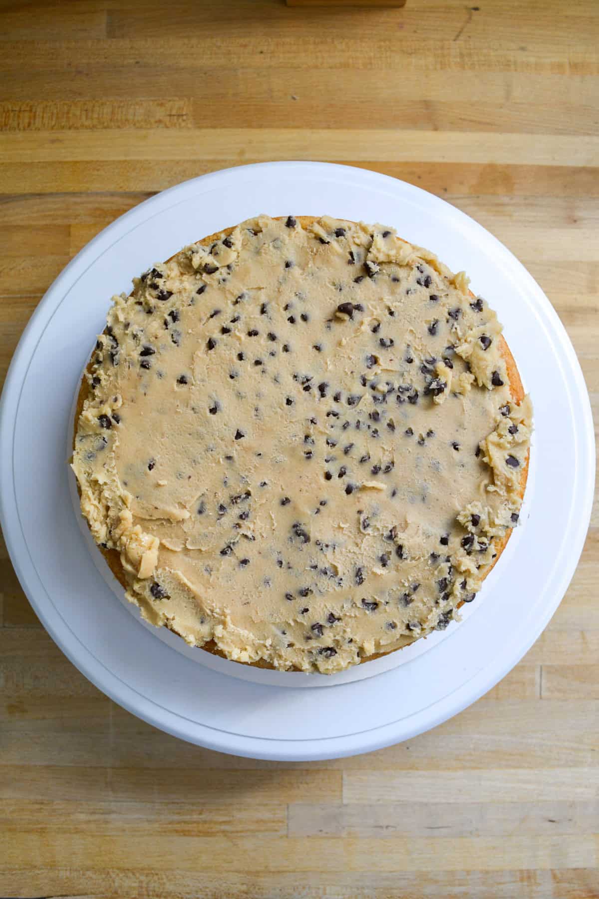 A cake layer topped with cookie dough.
