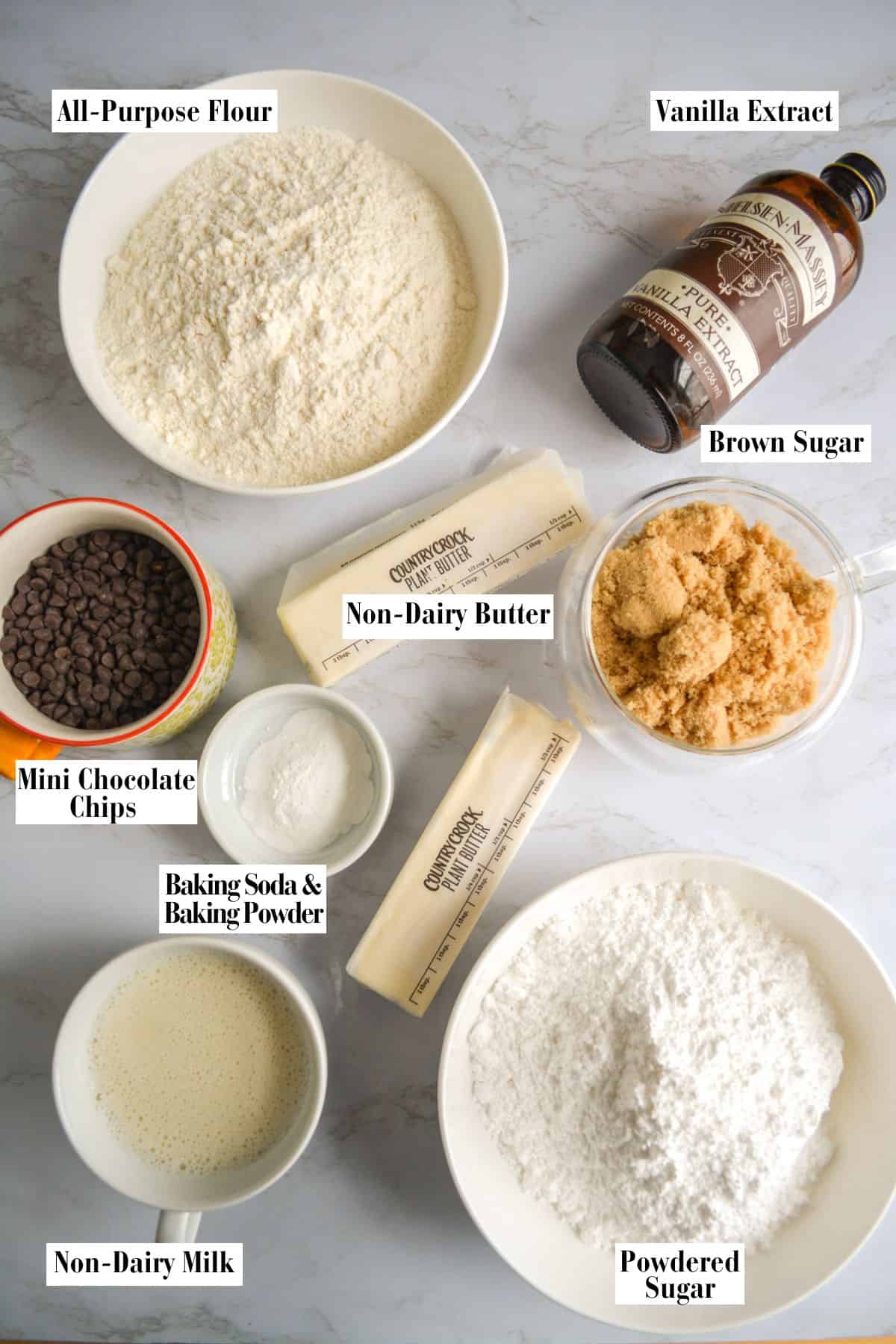 Ingredients for making this recipe in small bowls on a linen surface.