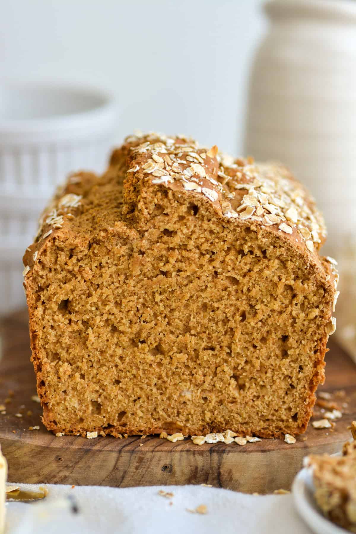 A loaf of Irish Brown Bread on a cutting board.