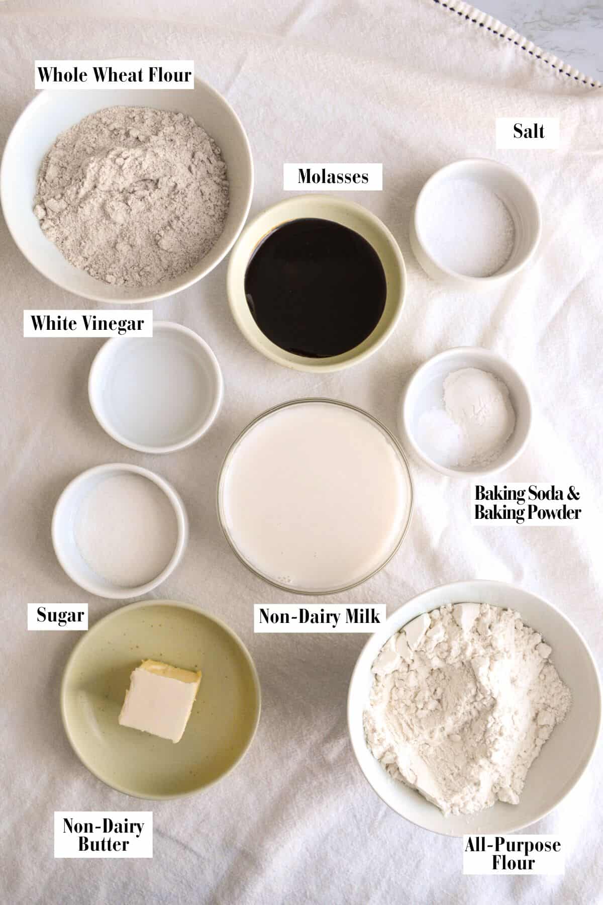 Ingredients for this recipe in small bowls on a linen surface.