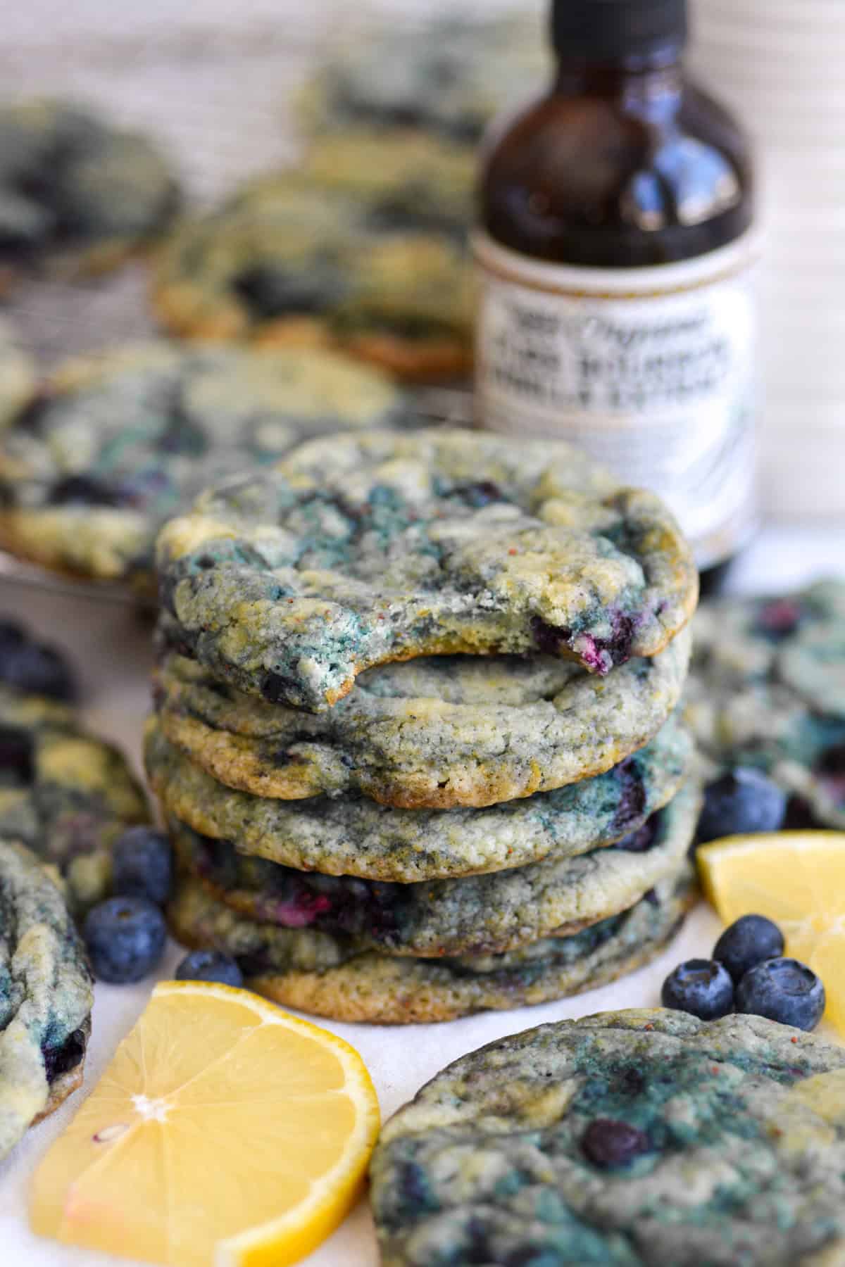 A stack of Vegan Blueberry Lemon Cookies on a linen cloth.