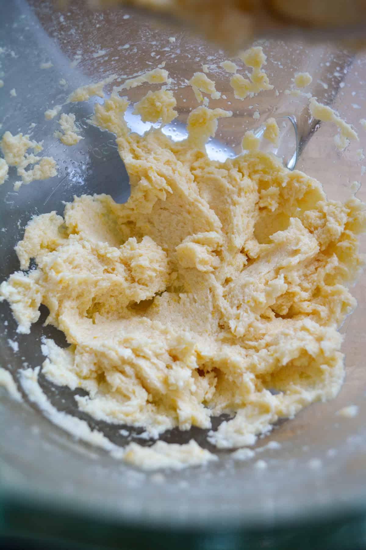 Non-dairy milk and vanilla added into the bowl.