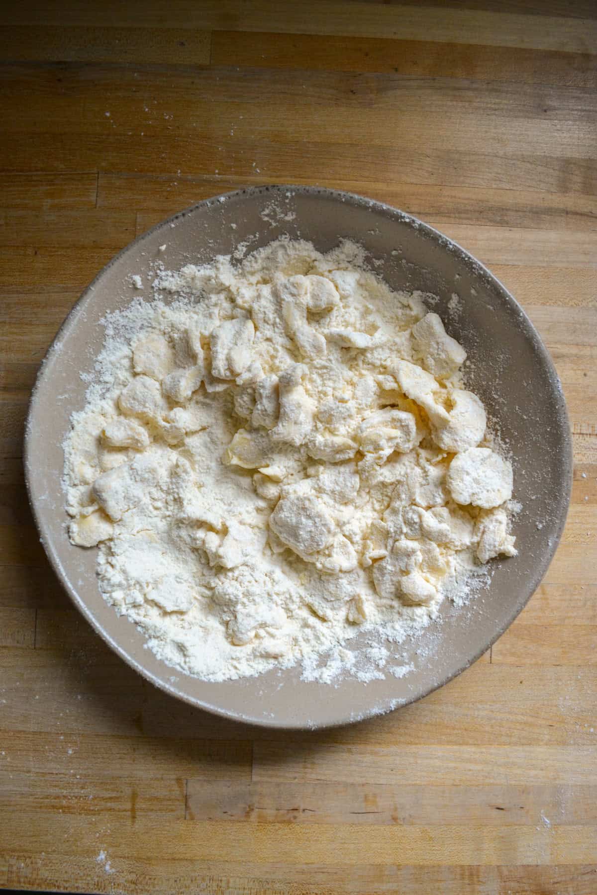 Butter cut into the flour in a large bowl.