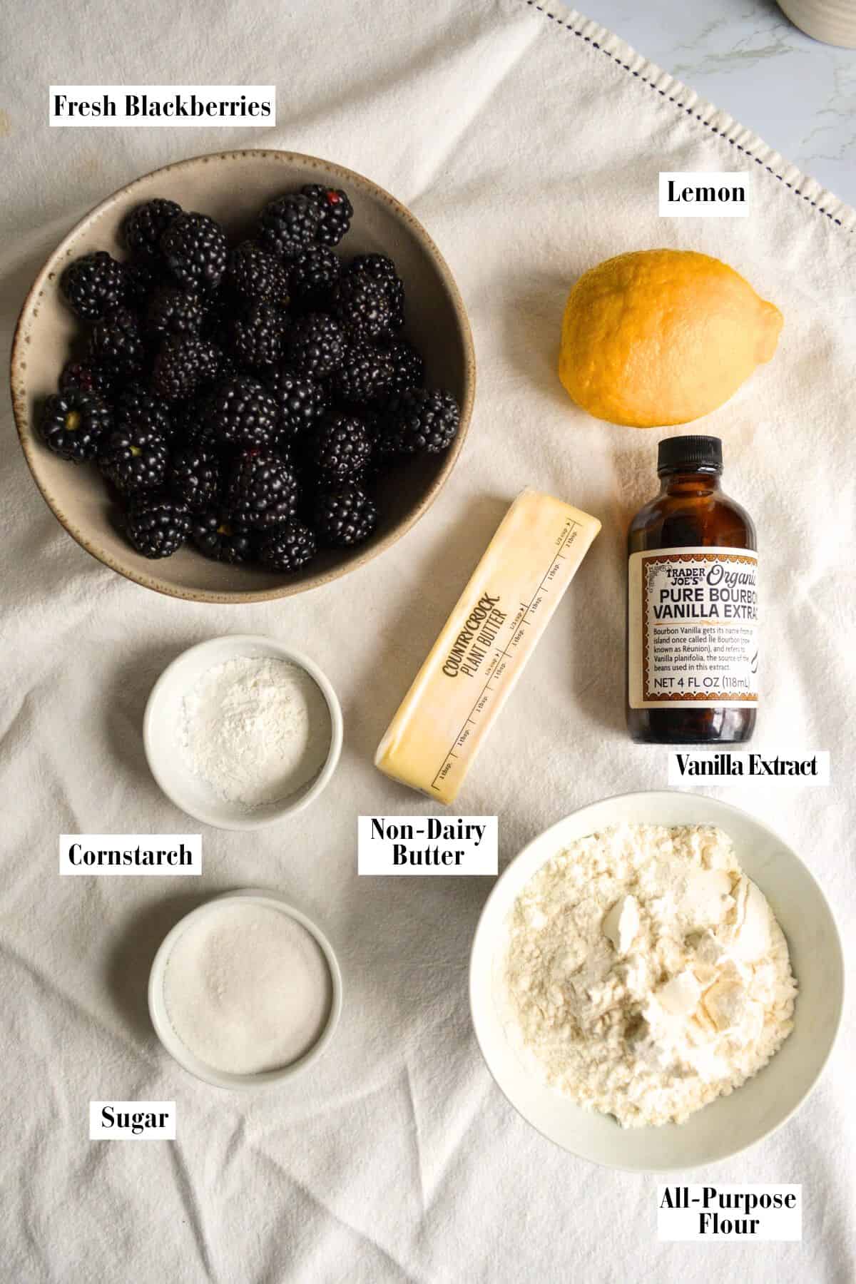 Ingredients for this recipe in small bowls on a linen surface.