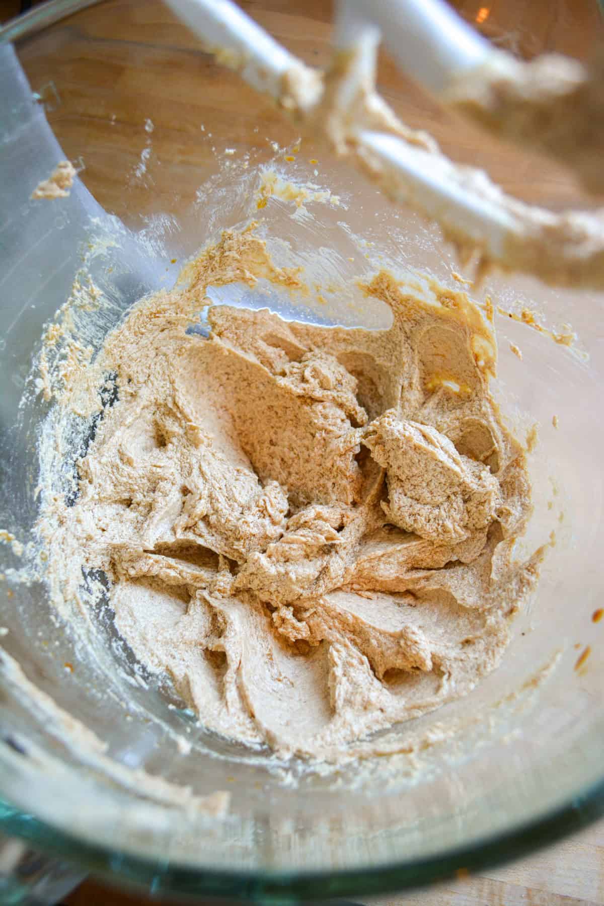 Non-dairy milk and espresso added to the glass bowl.