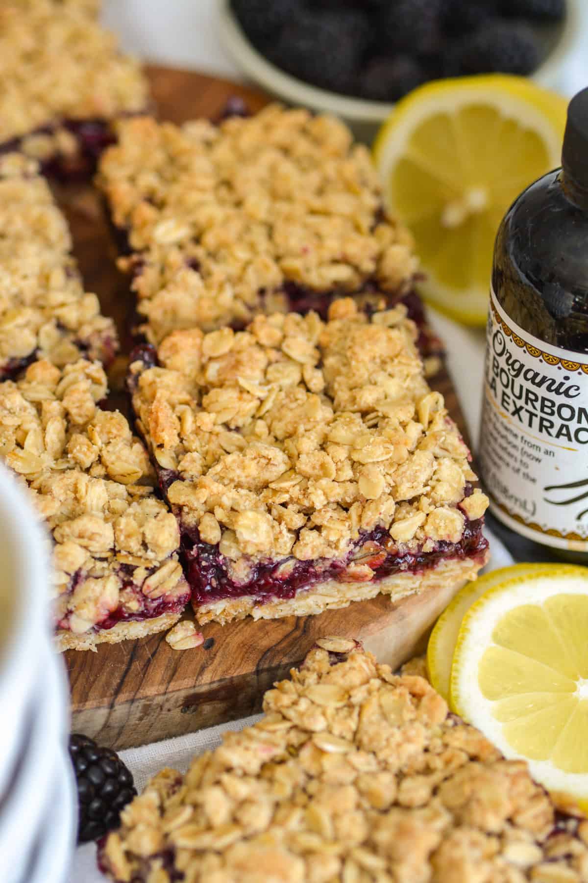 Blackberry Oat Bars on a wooden board.