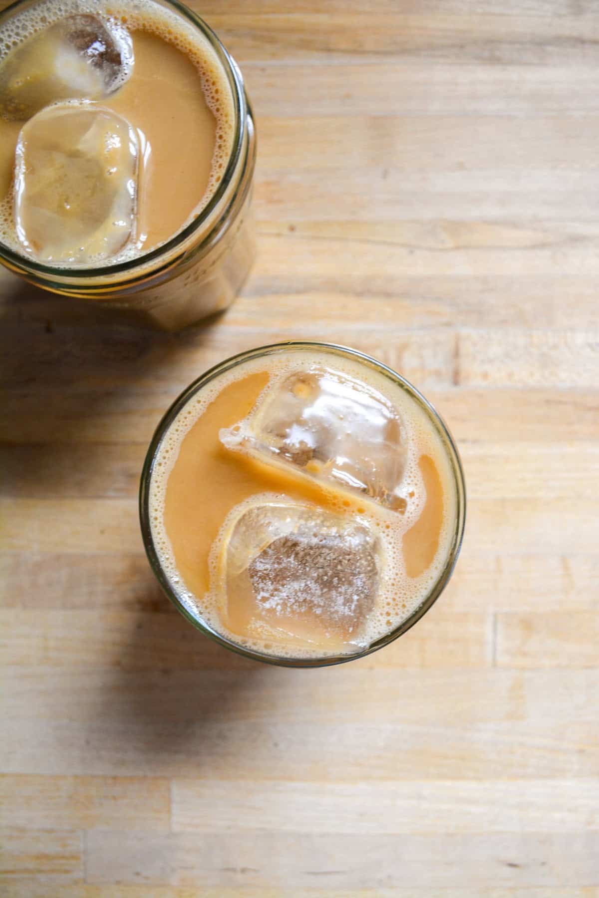 Ice and espresso added into the glass.