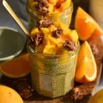 Mango Chia Seed Pudding in a glass jar topped with mango chunks.